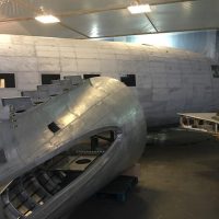 The fuselage and tail section in the hangar